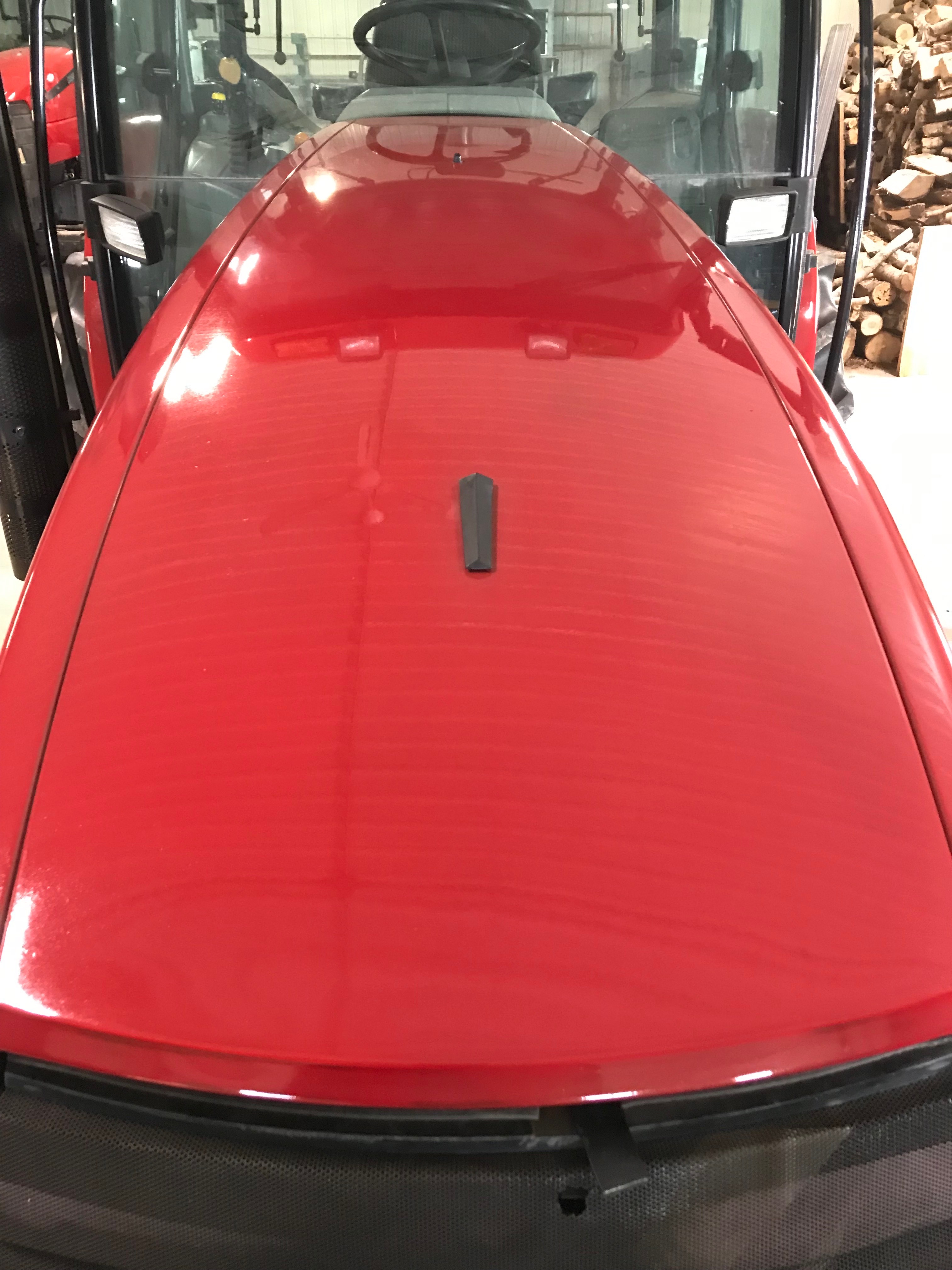 Manufacturer after example: red equipment hood with deeper colour and clearer reflections